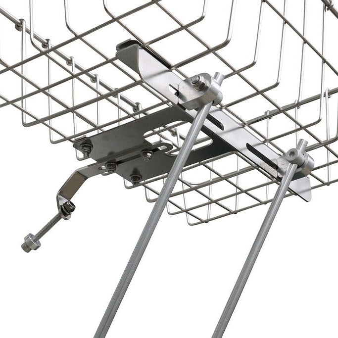 Metal bike basket with stand on a white background