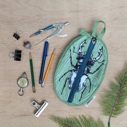 ilikesara | art + goods - Zippered pouch | stag beetle - green insect/bug pencil, supply, makeup bag with waterproof lining