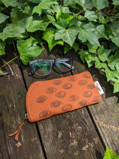 ilikesara | art + goods - Glasses case | eye glasses - orange & brown eyeball cushioned zipper bag