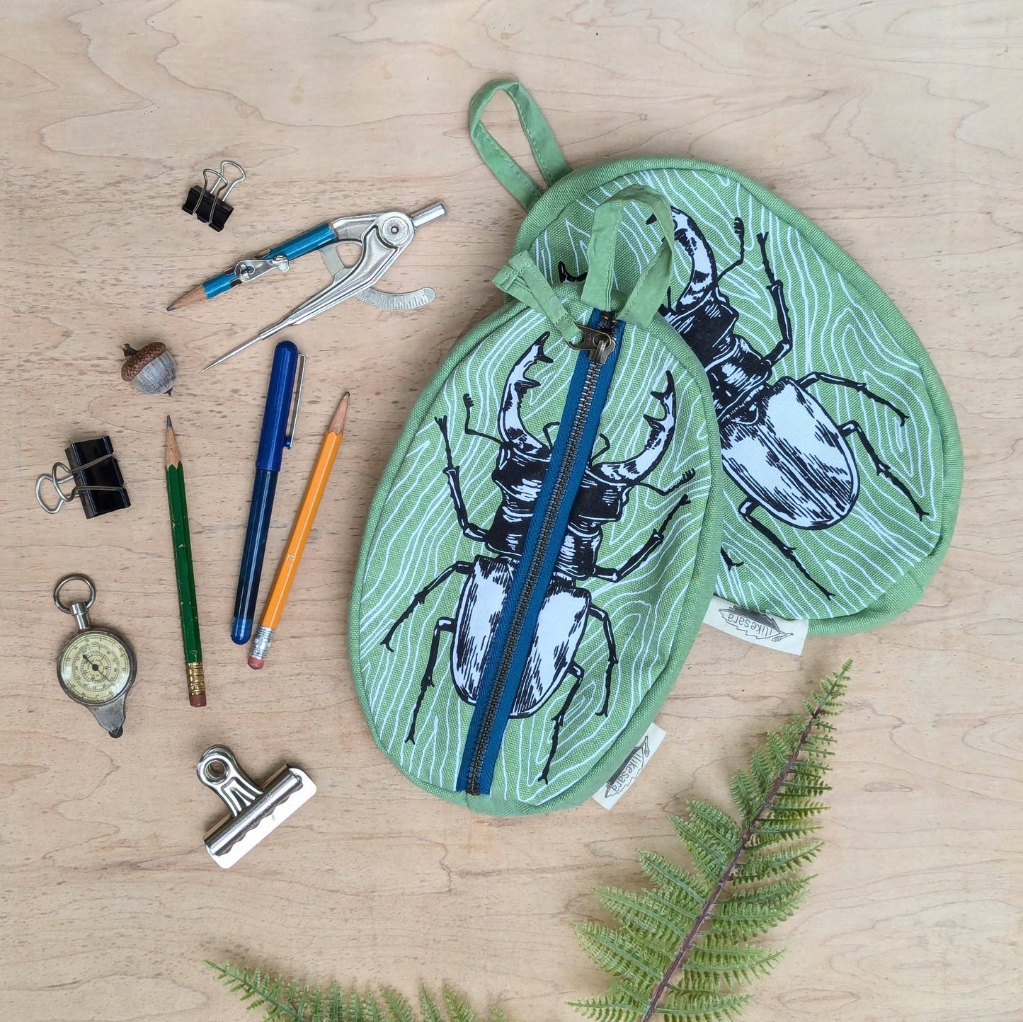 ilikesara | art + goods - Zippered pouch | stag beetle - green insect/bug pencil, supply, makeup bag with waterproof lining