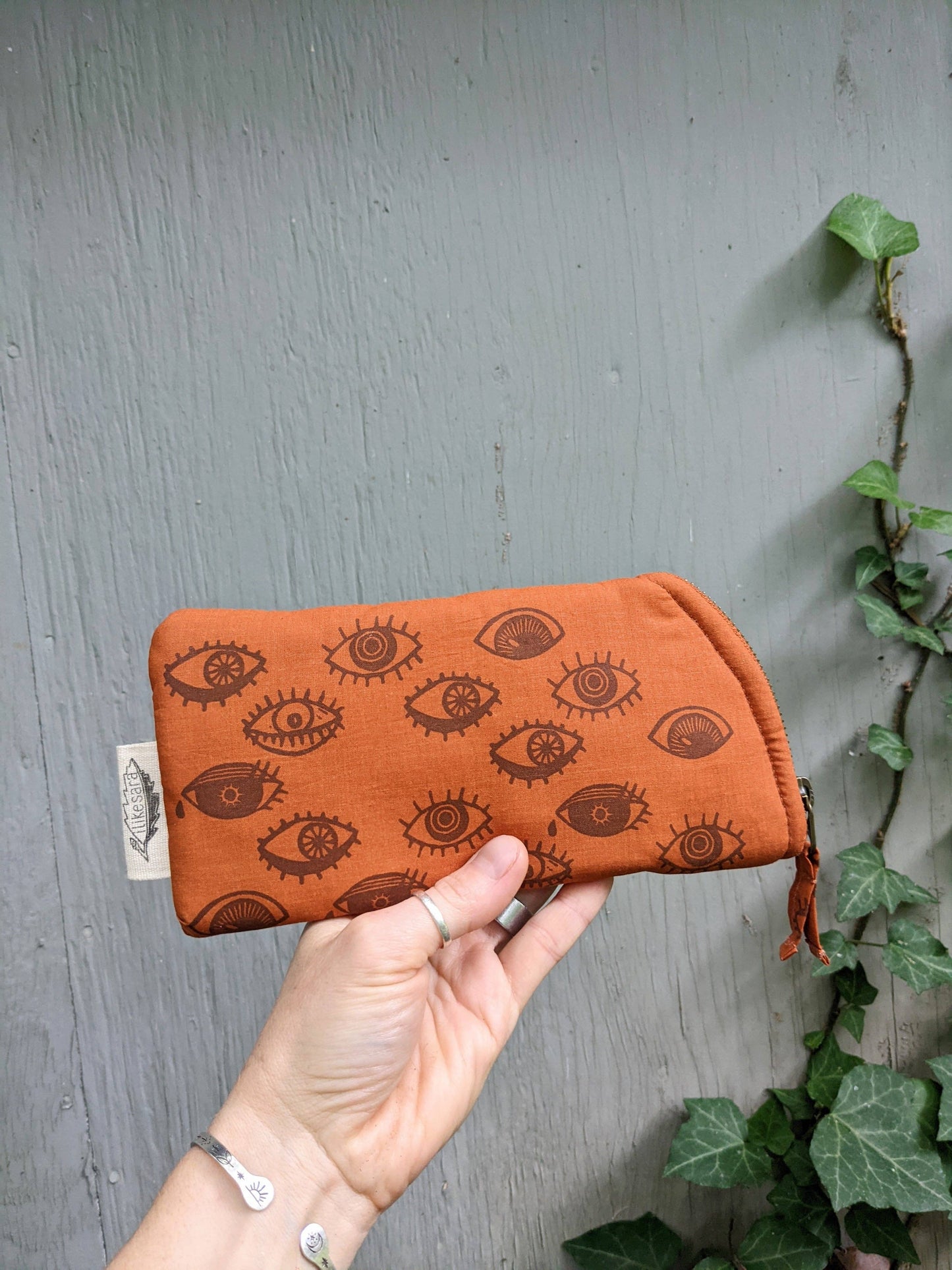 ilikesara | art + goods - Glasses case | eye glasses - orange & brown eyeball cushioned zipper bag