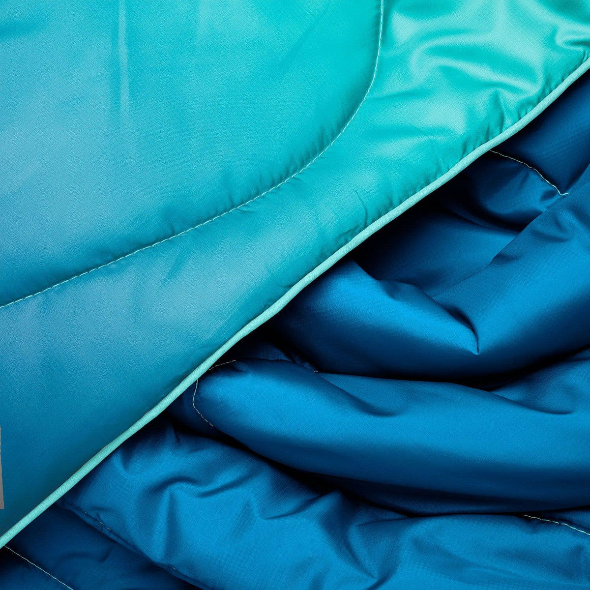 Rumpl - Travel Puffy Blanket - Deepfoam Fade