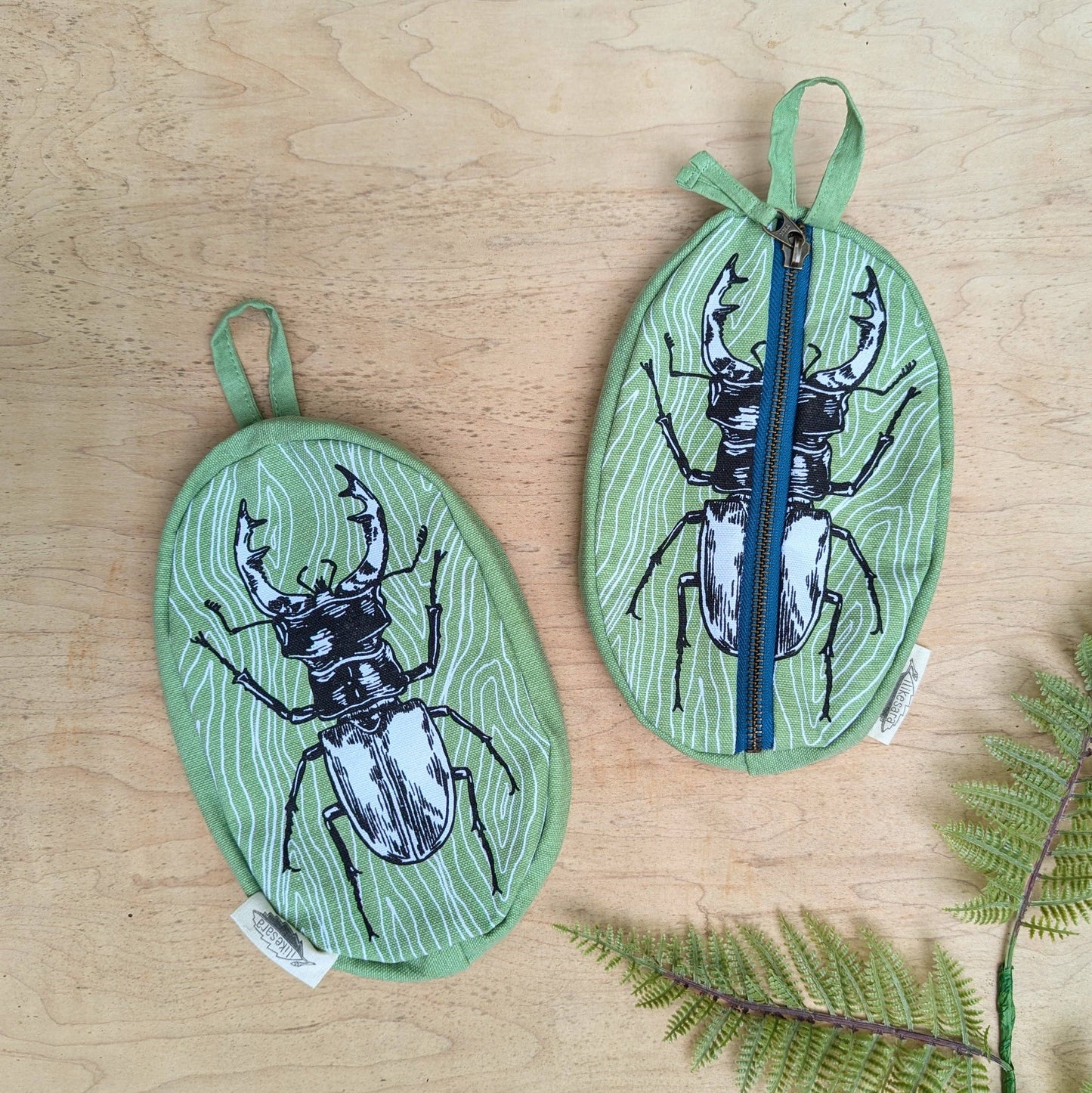ilikesara | art + goods - Zippered pouch | stag beetle - green insect/bug pencil, supply, makeup bag with waterproof lining