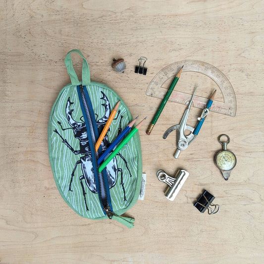 ilikesara | art + goods - Zippered pouch | stag beetle - green insect/bug pencil, supply, makeup bag with waterproof lining