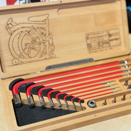 Set of hex keys in a wooden case with engraved Brompton design