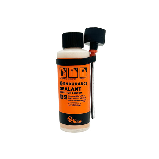 Bicycle sealant bottle with orange label on a white background