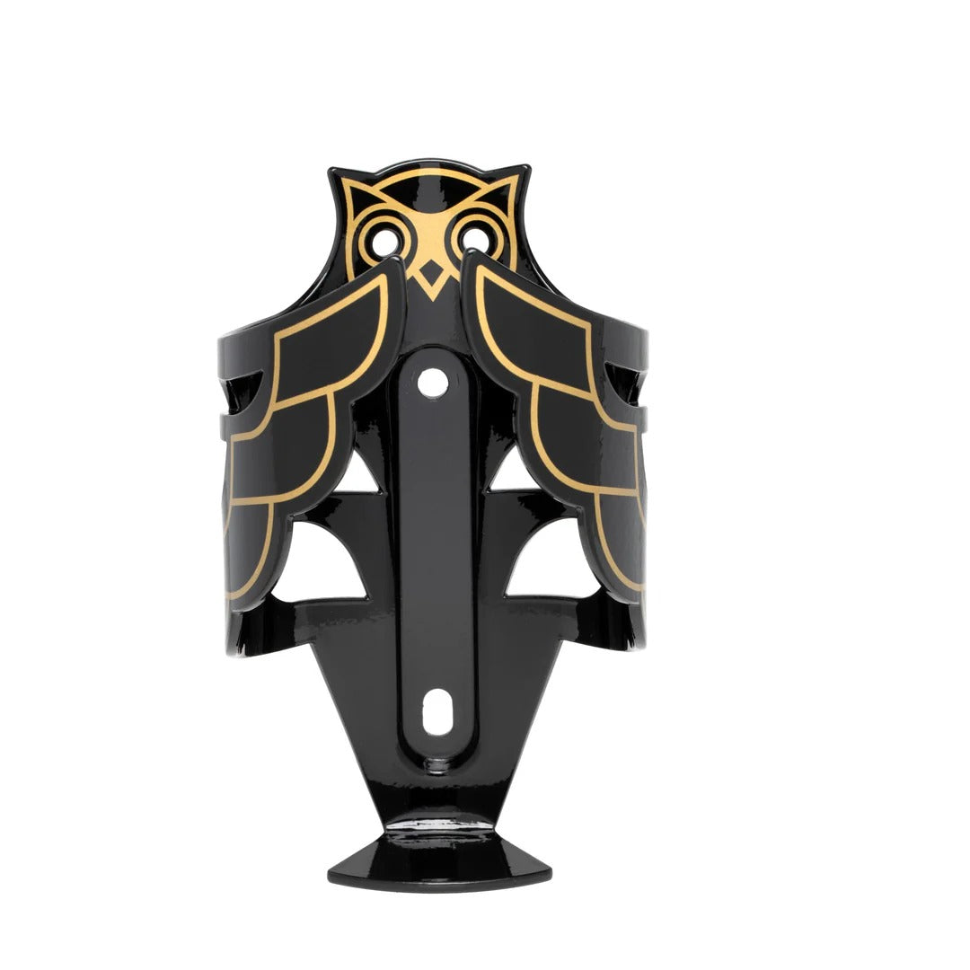 Black and gold owl-shaped bottle holder on a white background