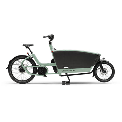 Green cargo bike with black seat on a white background