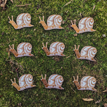 ilikesara | art + goods - Iron-on patch | slow down snail - brown 1.6" x 2.6"