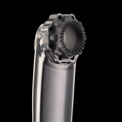 Close-up of a mechanical component with gears on a black background