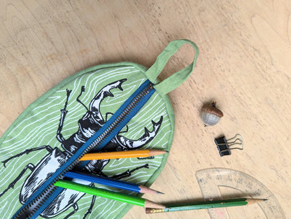 ilikesara | art + goods - Zippered pouch | stag beetle - green insect/bug pencil, supply, makeup bag with waterproof lining