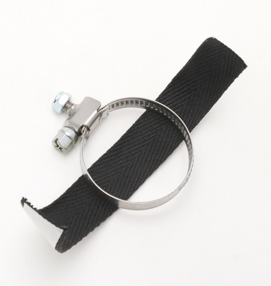 Black strap with metal clasp on a white background
