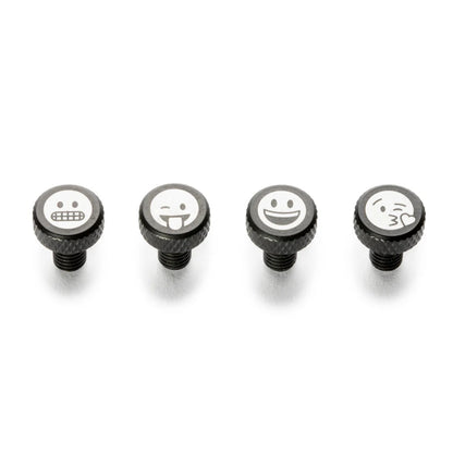Four black screws with emoji faces on a white background